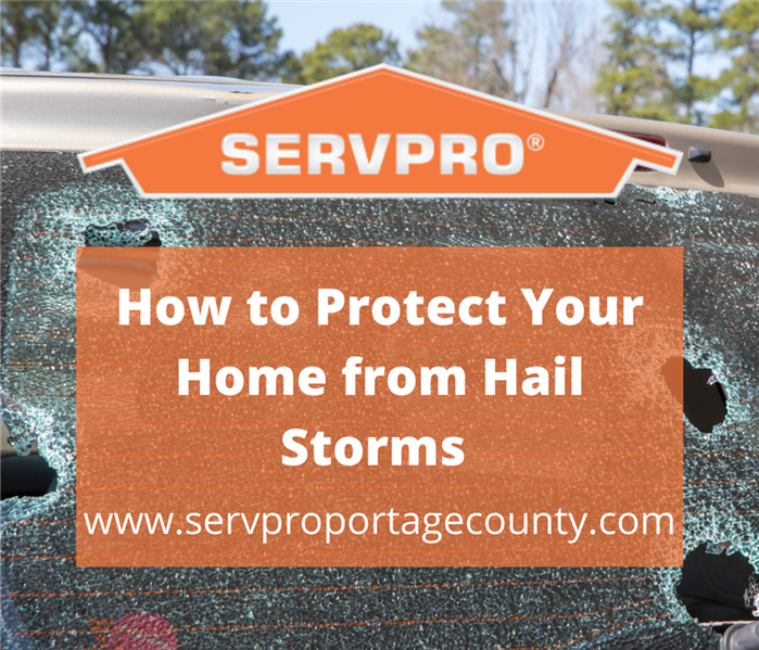 Back windshield of a car with 4 holes from hailstones. How to Protect Your Home from Hail Storms  - www.servproportagecounty.